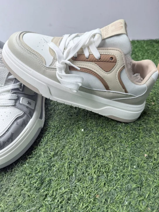 Beige tan and grey monogram unisex designer chunky sneakers close-up